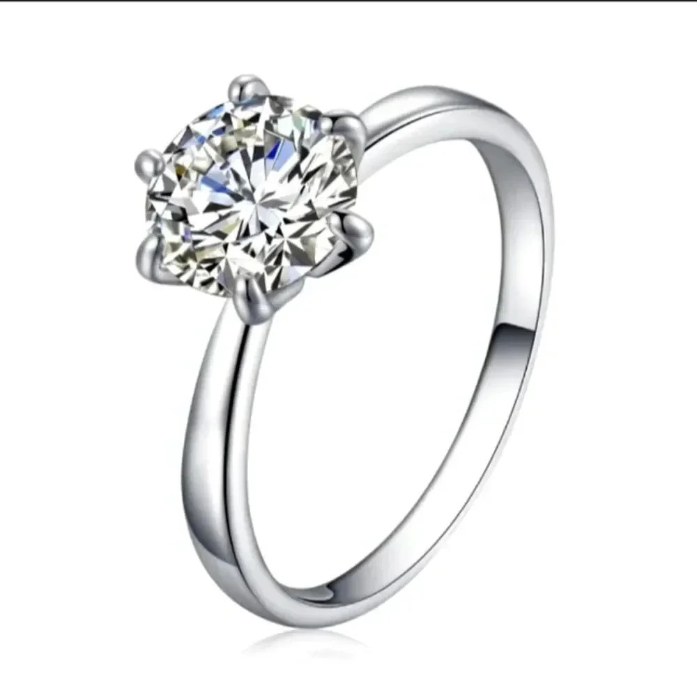 Elegant Women wedding party ring..silver..size 6...NWT